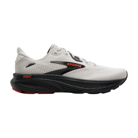 White running shoe with black sole and red accents on a white background