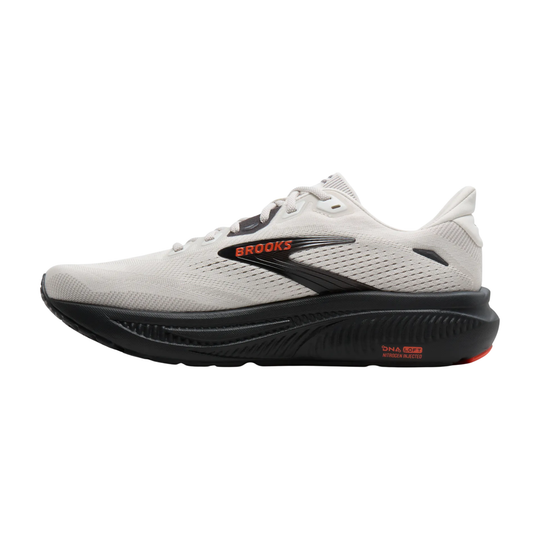 White running shoe with black sole on a white background