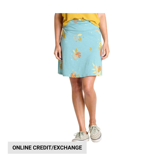 Light blue floral A-line skirt worn with a yellow top and gray checkered sneakers