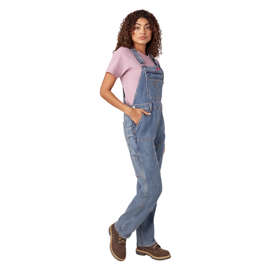 Dickies Women's Double Front Bib Overalls - Light Stonewash on a female model on a white background. 