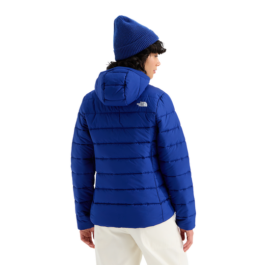 The North Face Women’s Aconcagua Hooded Jacket - Bold Blue on a female model on a white background.