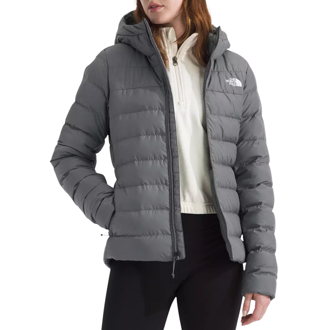 The North Face Women’s Aconcagua Hooded Jacket - Smoked Pearl on a female model on a white background.