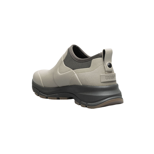 Beige and gray slip-on boot with a chunky black sole and BOGS heel tab