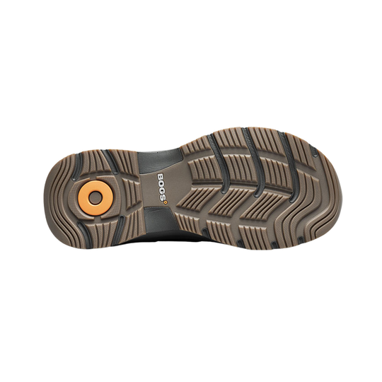 Brown and black boot sole with traction lugs and visible BOGS logo