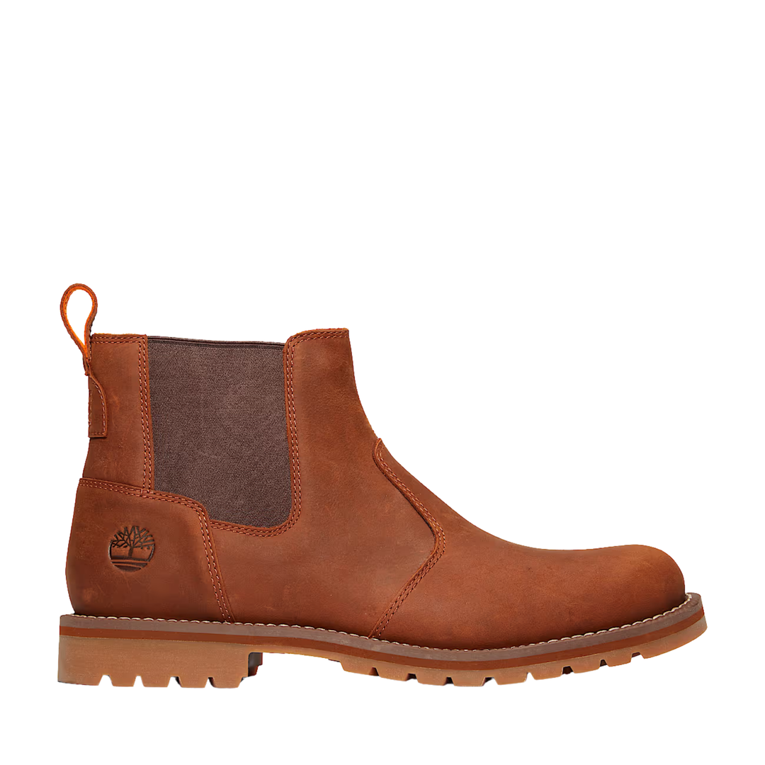 Brown leather boot with a visible brand logo on a white background