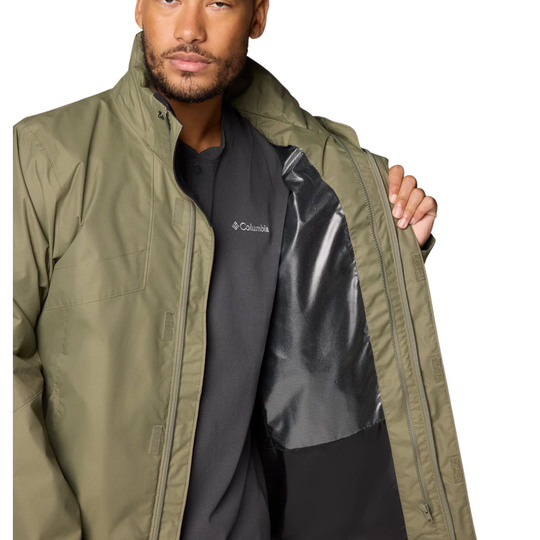 Olive green zip-up jacket with a black lining, worn open over a black Columbia shirt
