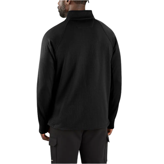 Person wearing a black quarter-zip sweatshirt and cargo pants on a white background