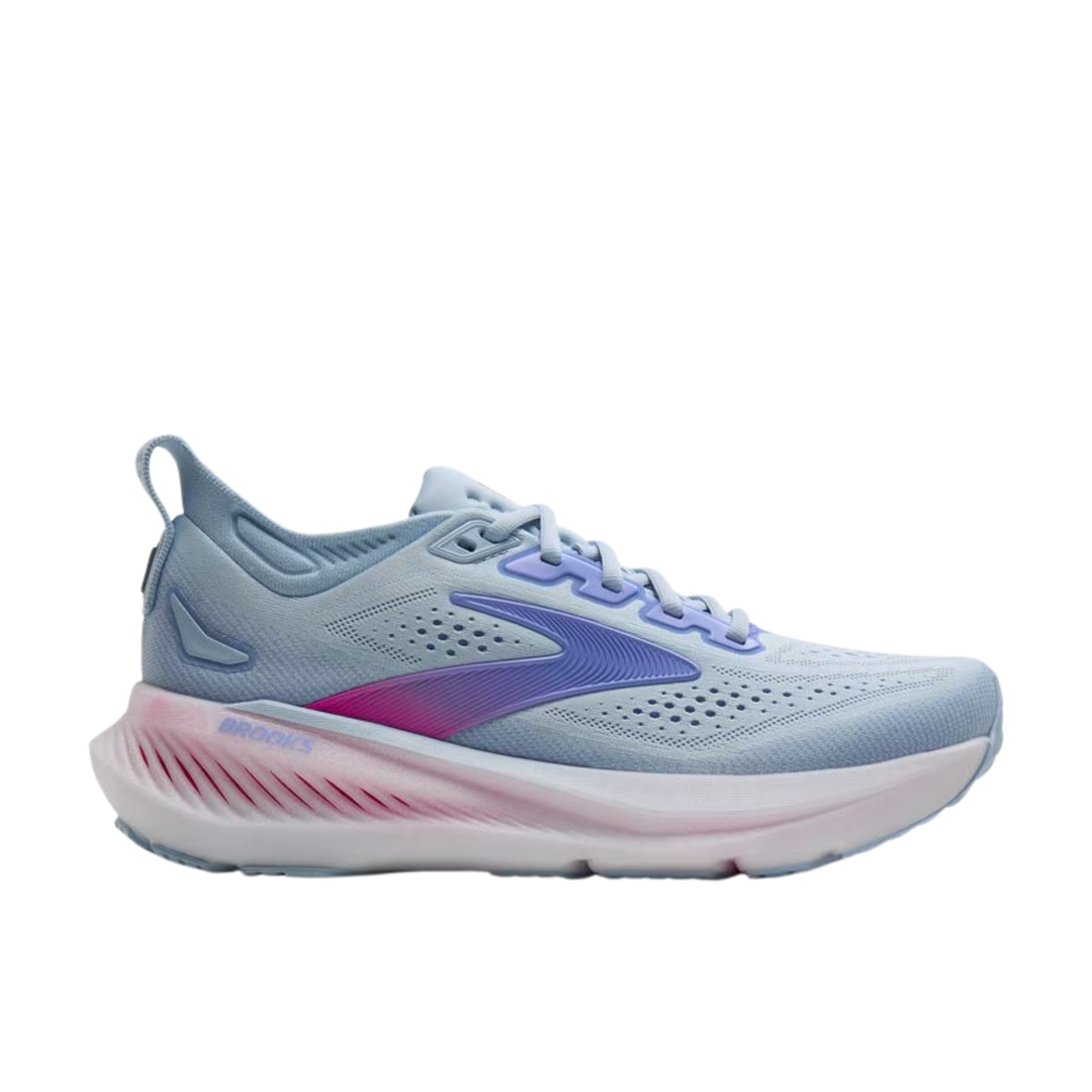 Light blue running shoe with pink sole on a white background