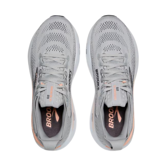 Pair of light gray running shoes with mesh uppers, laces, and peach accents