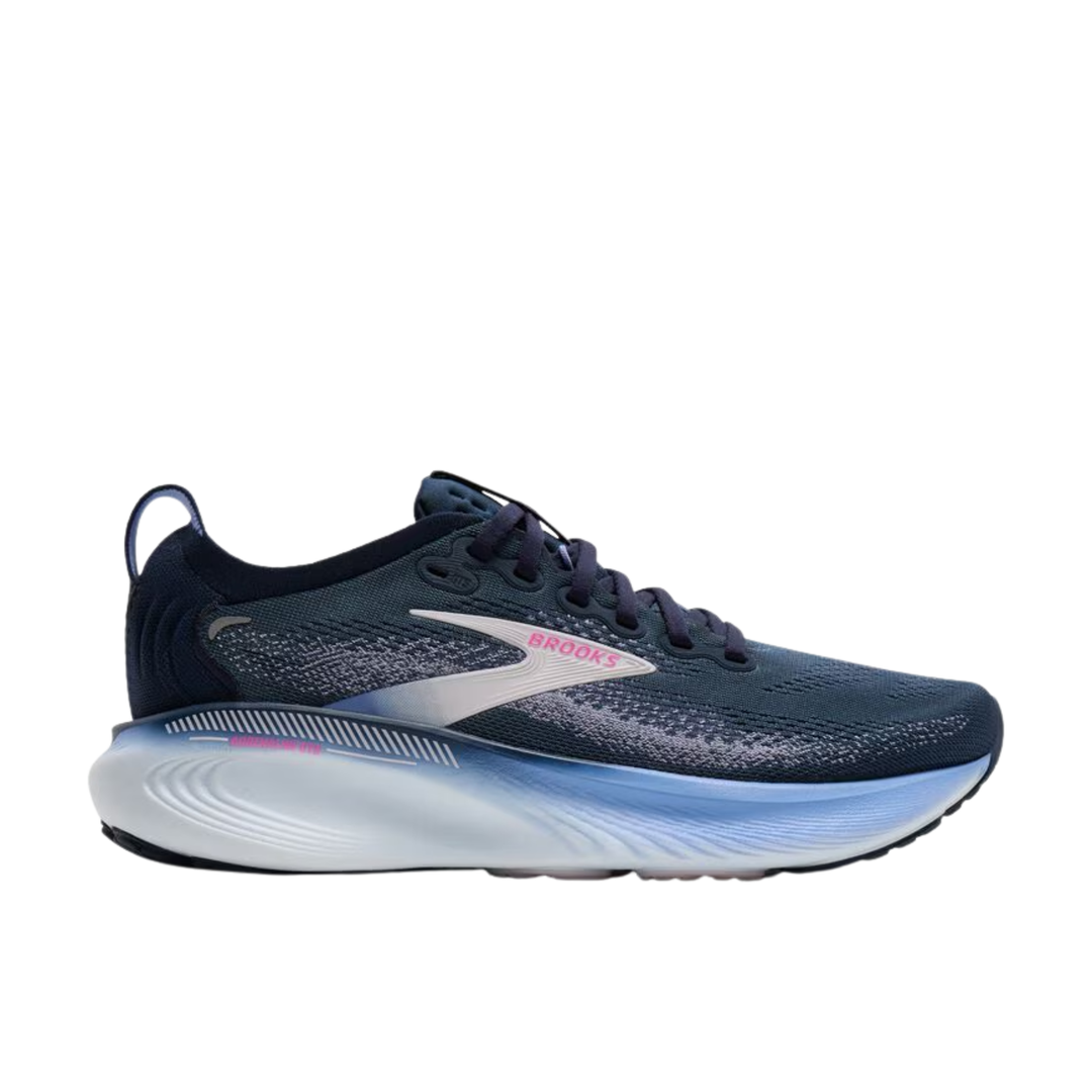 Navy running shoe with white sole on a white background