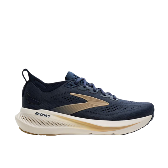 Navy running shoe with beige accents on a white background