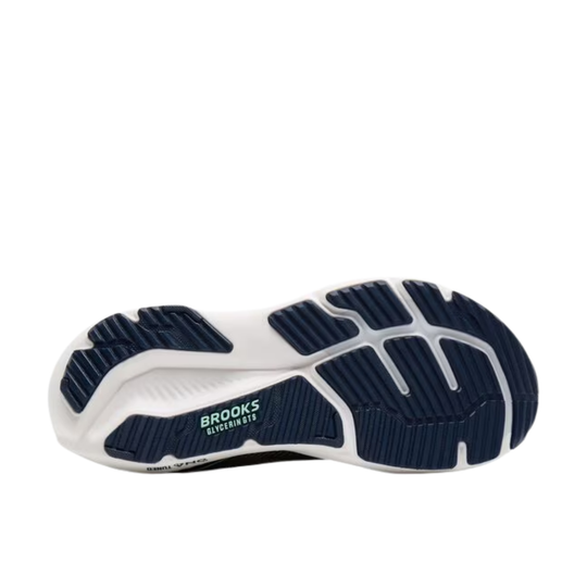 White running shoe sole with navy tread and Brooks Glycerin GTS text