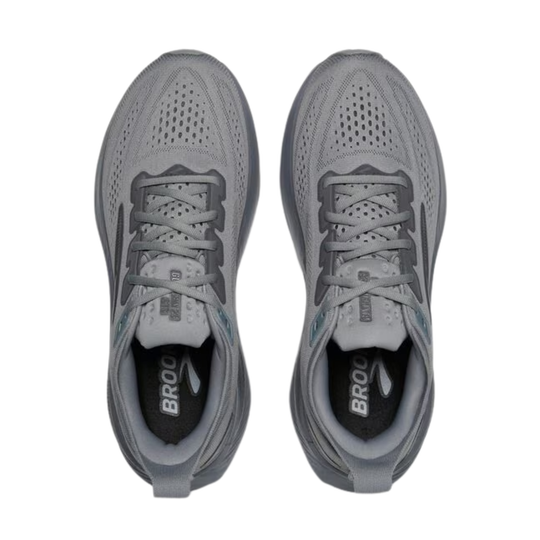 Pair of gray mesh running shoes with lace-up closures and Brooks branding on the insoles
