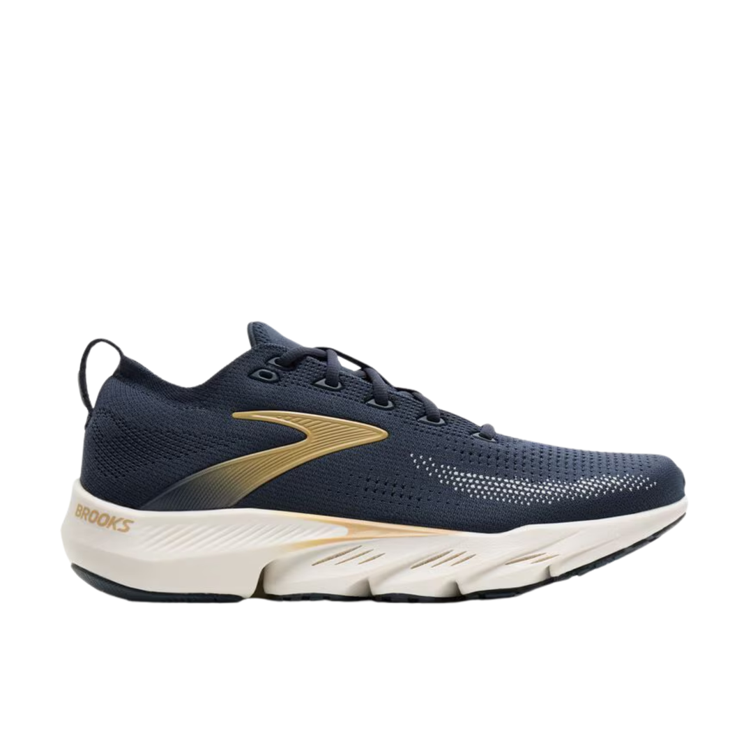 Navy running shoe with gold accents on a white background