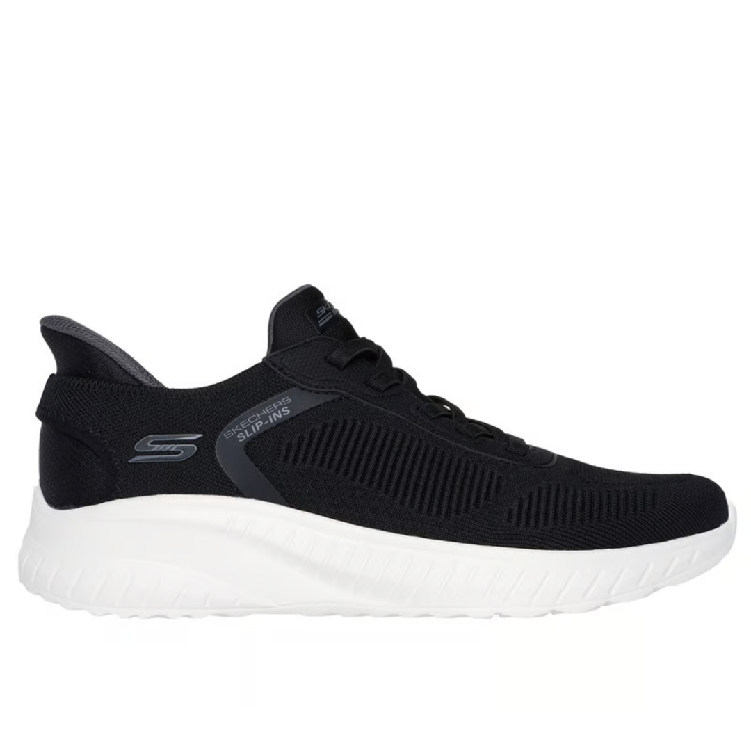 Black sneaker with white sole on a white background