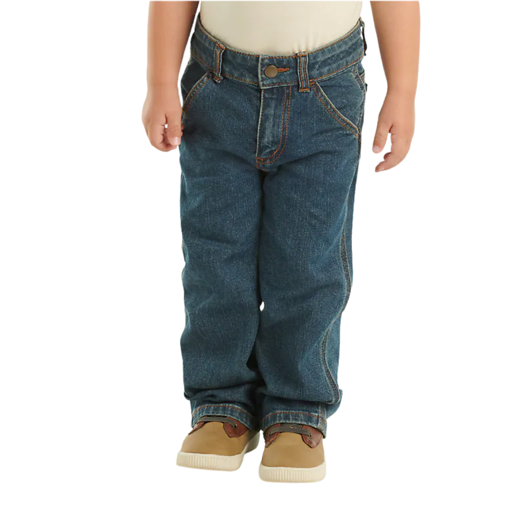 Child wearing blue jeans on a white background