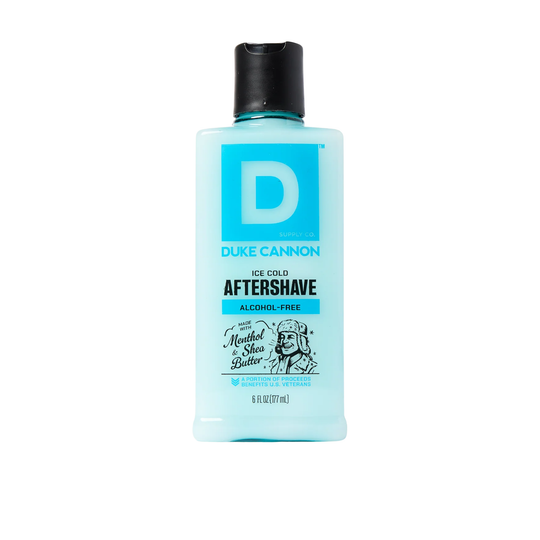 Light blue aftershave bottle with black cap and large D label on a white background