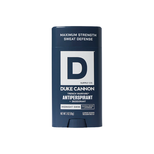 Navy antiperspirant deodorant stick with a large D logo and visible sweat defense text