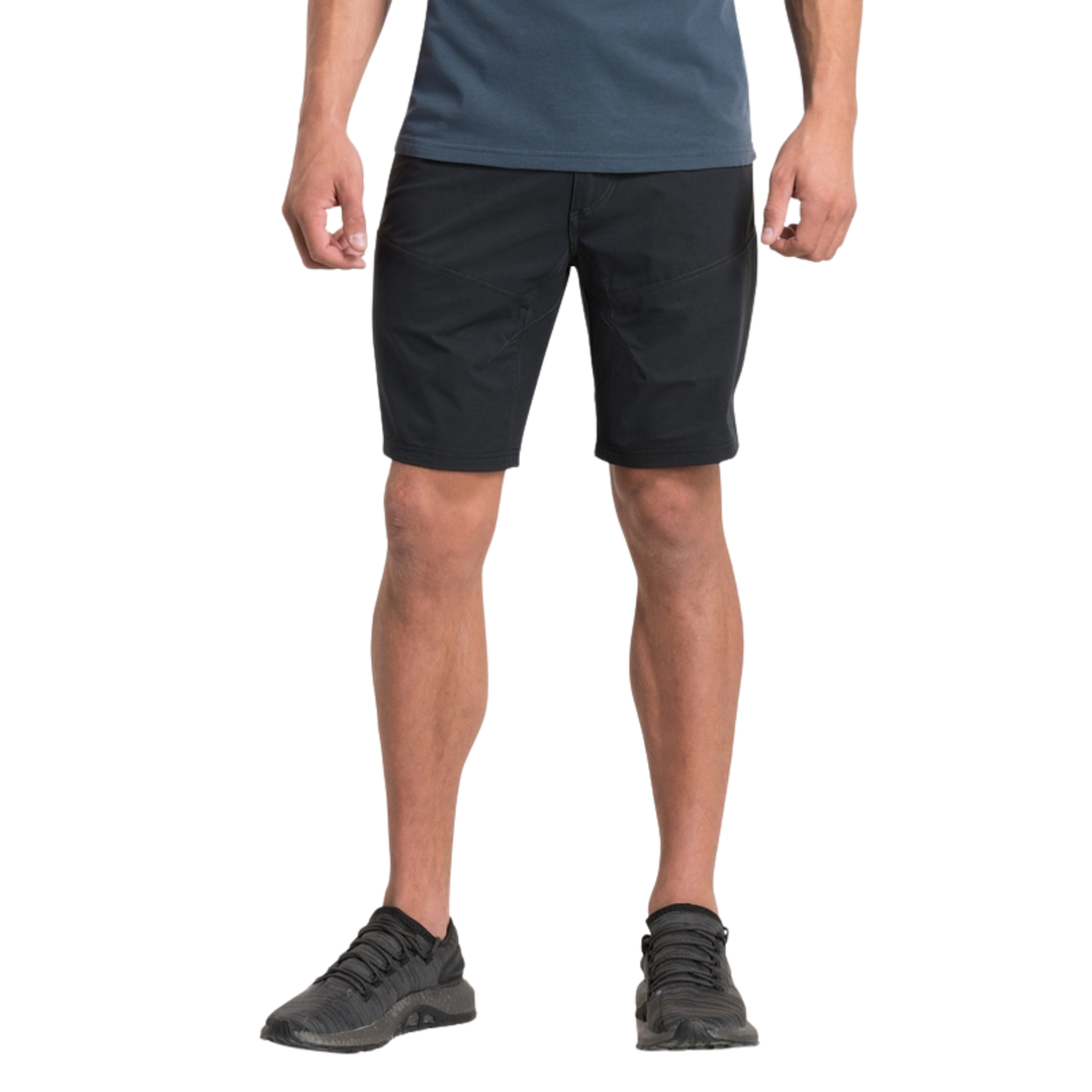 Person wearing black shorts on a white background