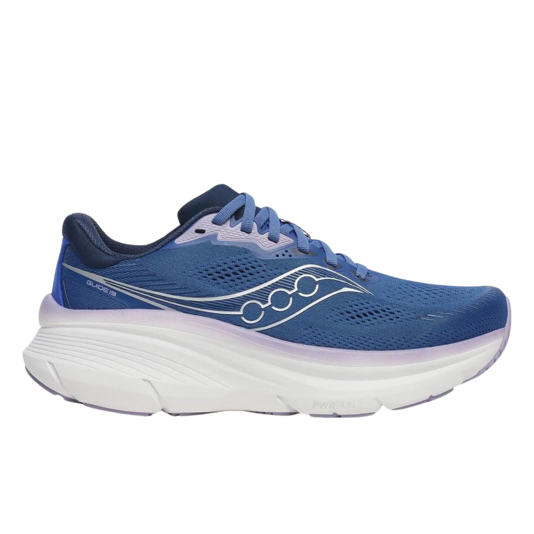 Navy blue sneaker with a white sole on a white background
