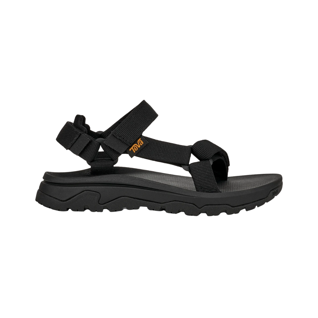 Black sandal with a brand logo on a white background