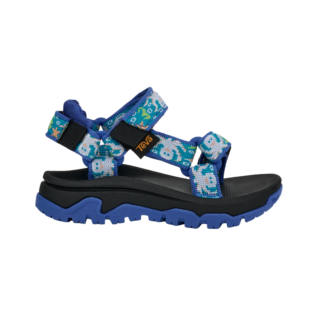 Blue and black sandal with octopus pattern on a white background