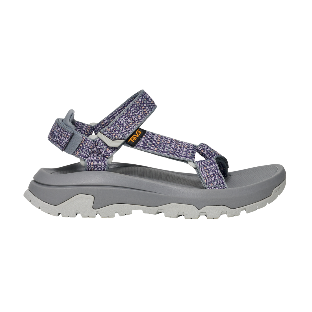 Grey sandal with beige sole on a white background