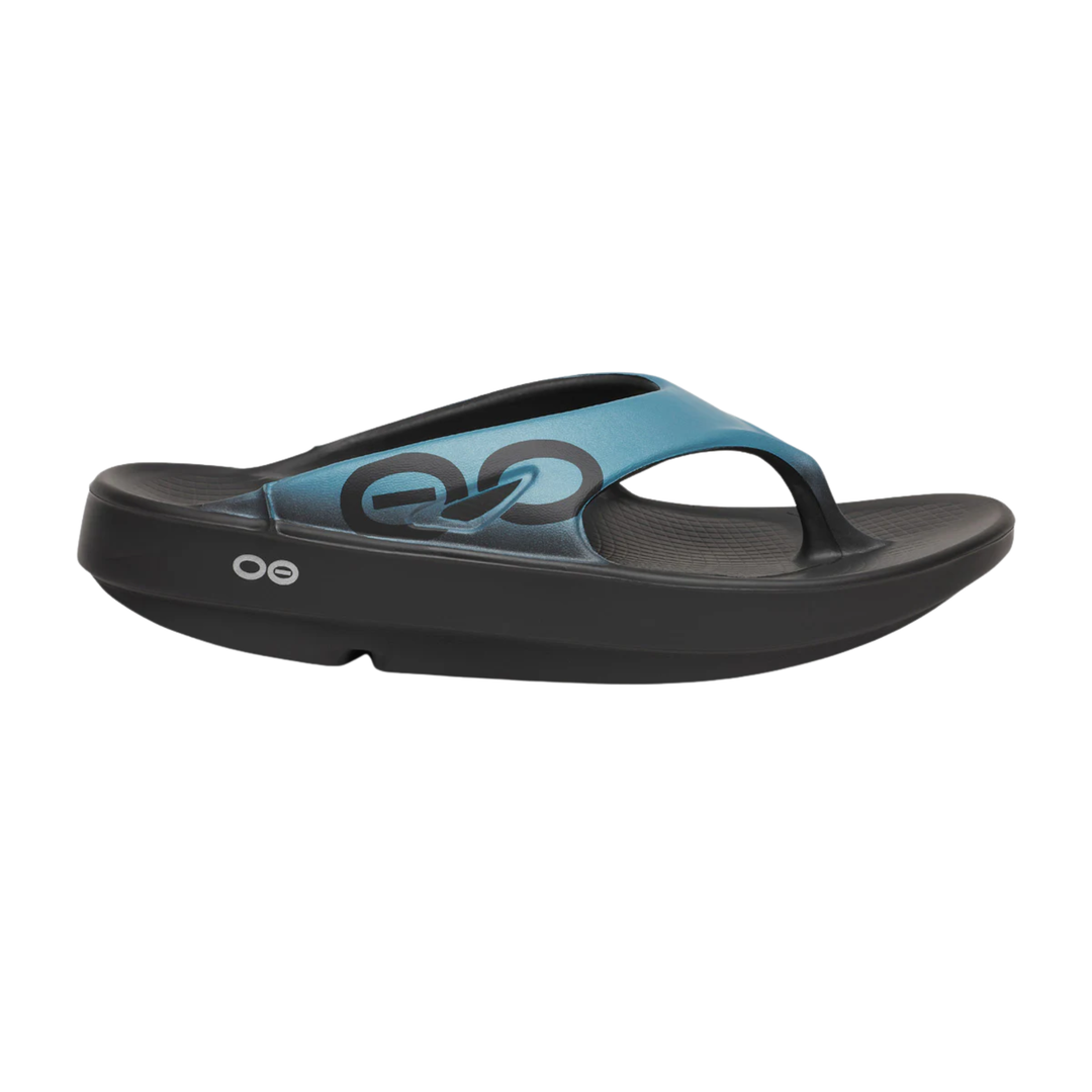 Black and blue sandal with brand logo on a white background