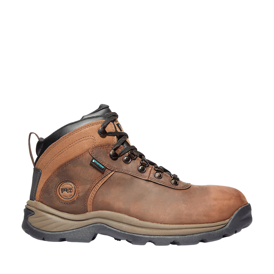 Brown leather boot with black sole on a white background
