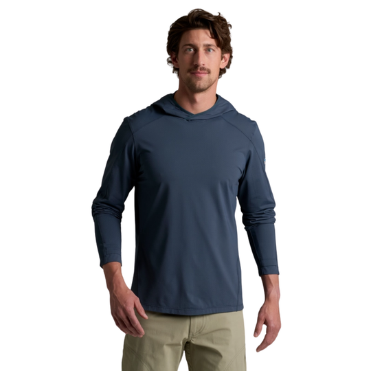 Man wearing a navy blue long-sleeve hoodie on a white background