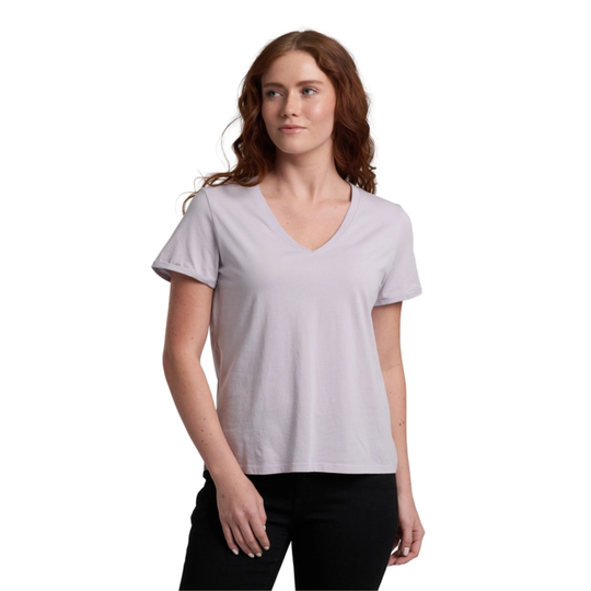 Woman wearing a light gray t-shirt on a white background