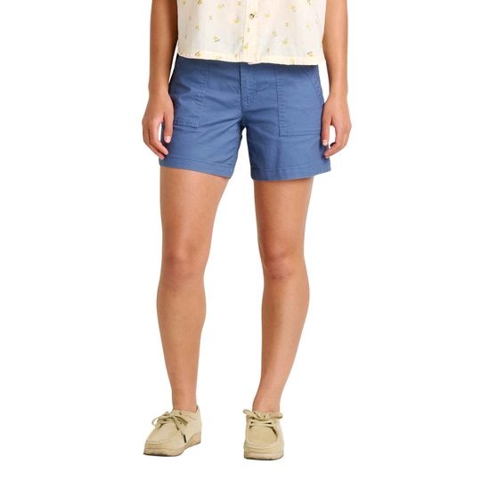 Person wearing blue shorts on a white background