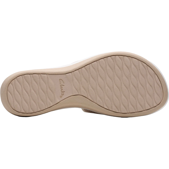 Beige sandal sole with textured tread and Clarks branding