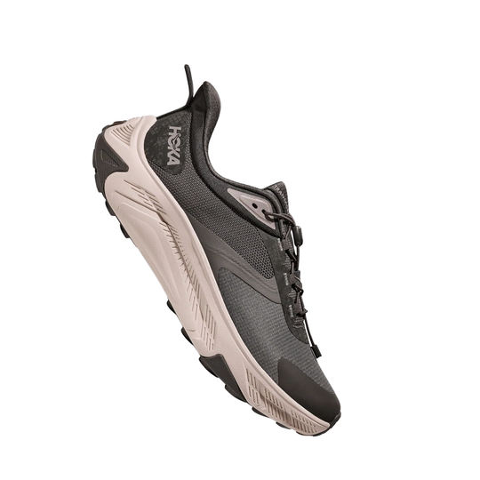 Black and gray hiking shoe with a thick light sole, side mesh panels, and bungee laces