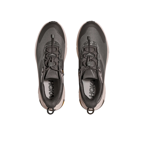 Top view of two dark gray hiking shoes with bungee laces and pull loops