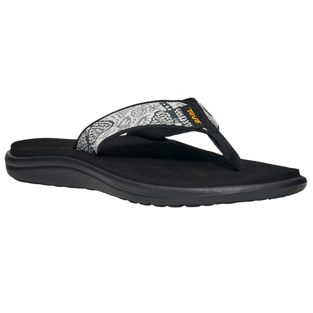 Black sandal with a patterned strap on a white background