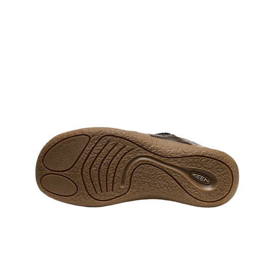 Brown rubber shoe sole with KEEN logo and tread grooves