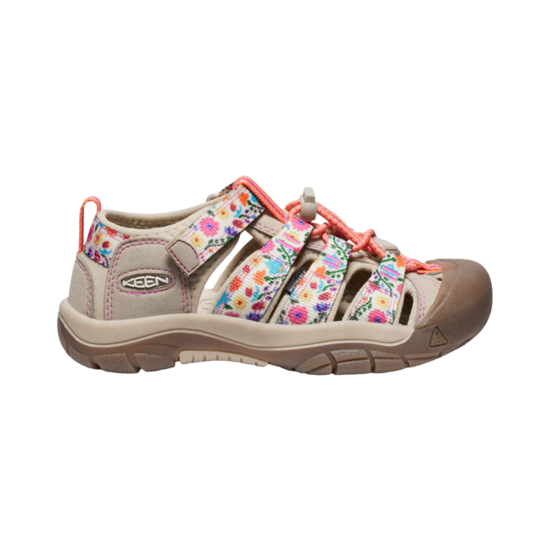 Kids' closed-toe hiking sandal with floral straps, beige upper, and brown rubber toe cap