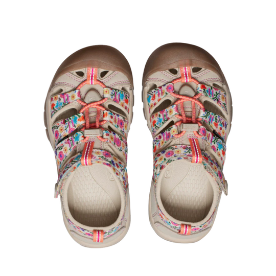 Pair of beige closed-toe hiking sandals with colorful floral straps and coral bungee laces, top view