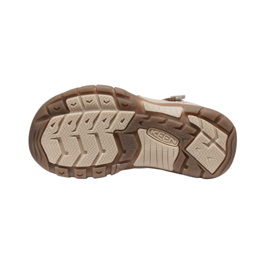 Brown and tan sandal outsole with rugged tread and KEEN logo