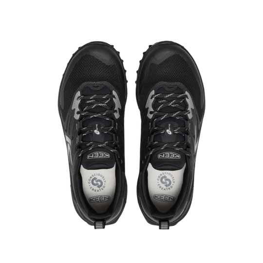Pair of black hiking shoes shown from above with bungee laces and textured mesh uppers