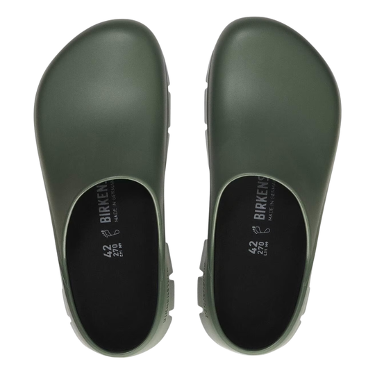 Pair of green clogs with 'Birkenstock' branding on a white background