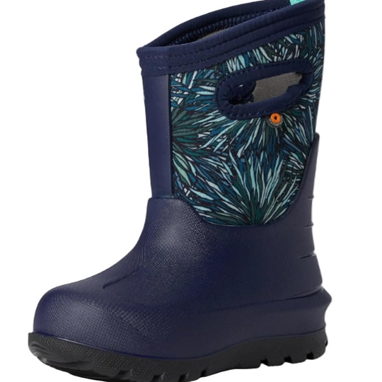 A navy blue kids' snow boot with a tropical palm leaf pattern in shades of teal and blue on the side, featuring a pull handle and a black rubber sole.