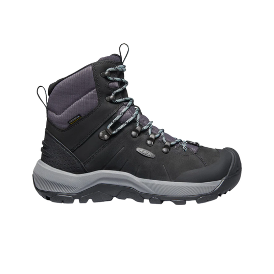 Black hiking boot with gray sole on a white background