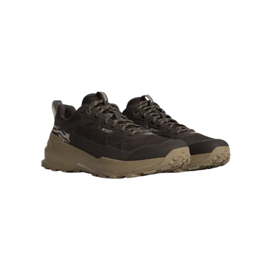 Pair of trail running shoe in dark brown and black with a tan sole, shown from a side profile on a white background.