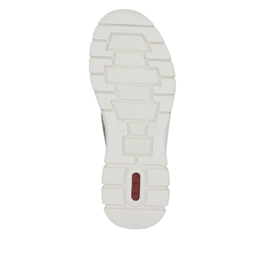 The outsole of a white athletic shoe, showing a textured tread pattern and a small red heel accent with the brand name 'rieker' visible.
