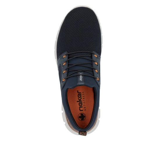 Navy blue sneaker with orange accents on a white background