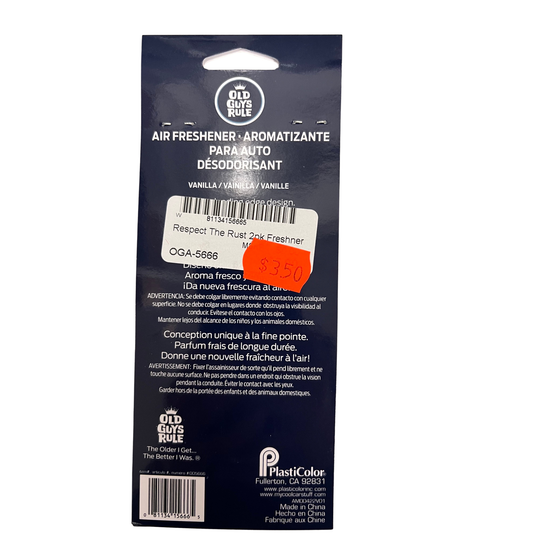 Back of a dark blue Old Mate Rule air freshener packet, showing product text, barcode, and a white sticker with a red price stamp. The packet is photographed against a plain white background.