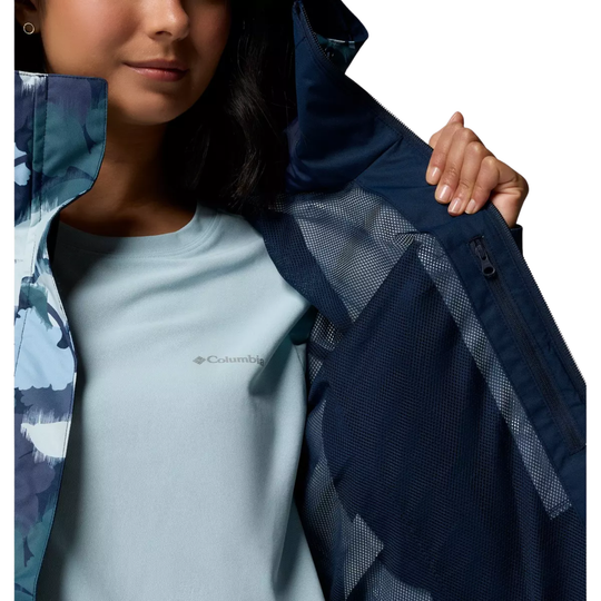Columbia Women's Hikebound Printed Hooded Rain Jacket - Collegiate Navy Ikatbloom on a female model on a white background. Showing the interior mesh of the jacket.