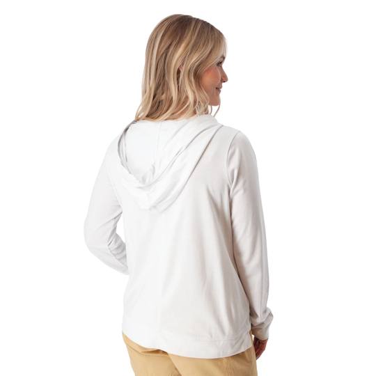 Woman wearing a white long-sleeve shirt on a white background